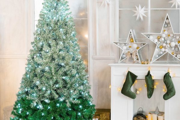 green christmas tree with white decorations