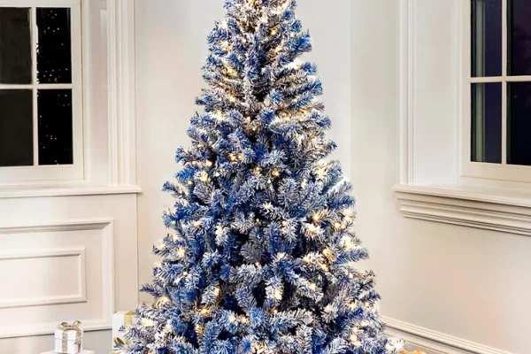 elegant white christmas tree with blue decorations
