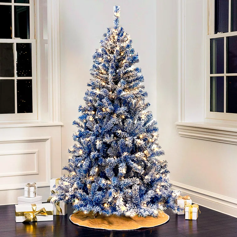 elegant white christmas tree with blue decorations