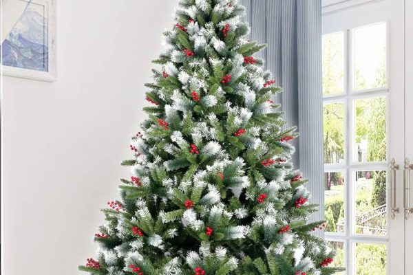 green christmas trees with white decorations