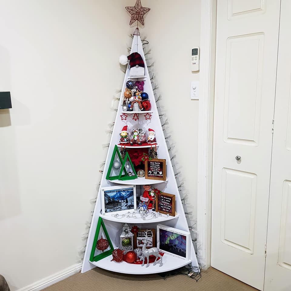 decorating a shelf for christmas